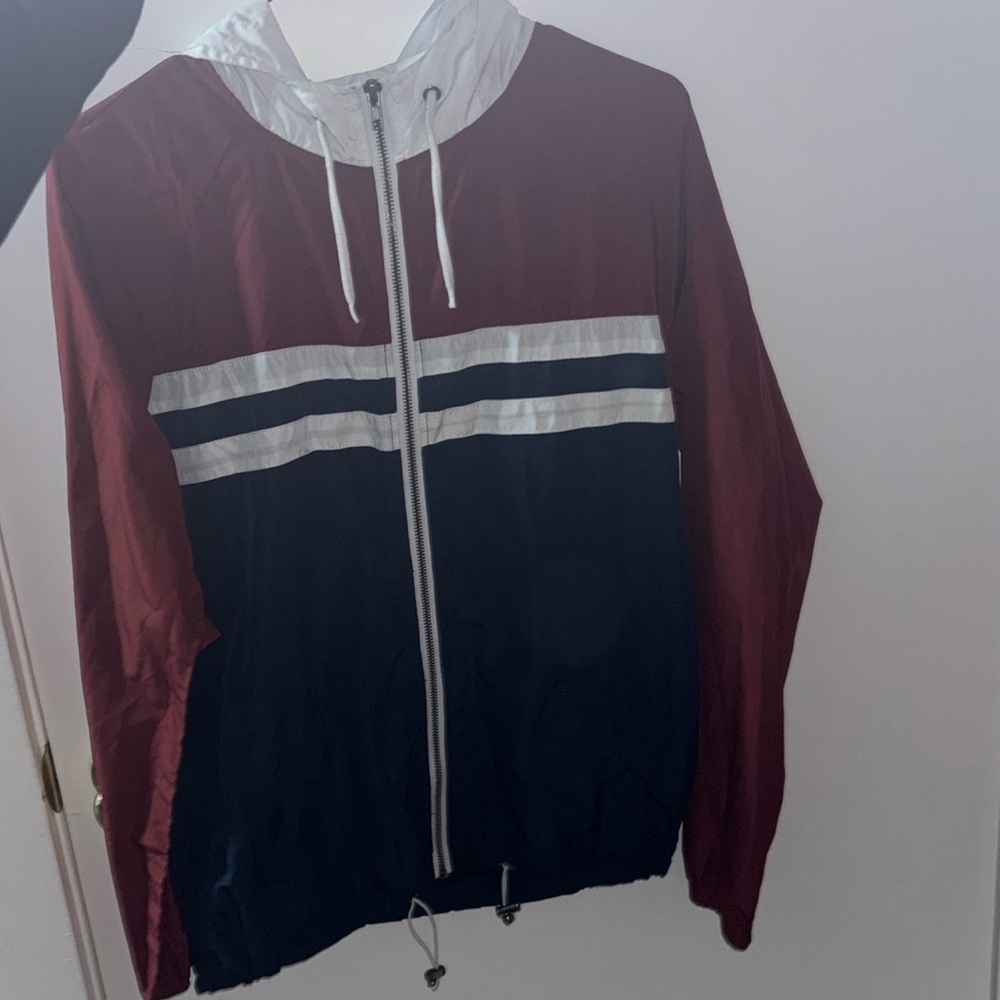 red,blue, and white zine windbreaker